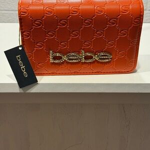 Bebe Orange Embossed Clutch with Metallic Logo